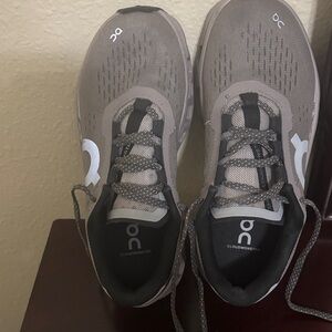 On Running Gray and Black Sneakers